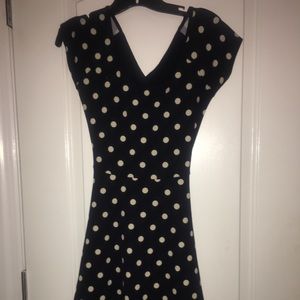 Navy blue polka dot dress fit and flare. Stretchy.